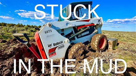 mud and water damage skid steer|skid steer stuck in dirt.